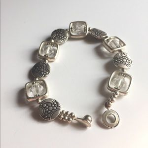 Silver bracelet with unique easy attach clasp